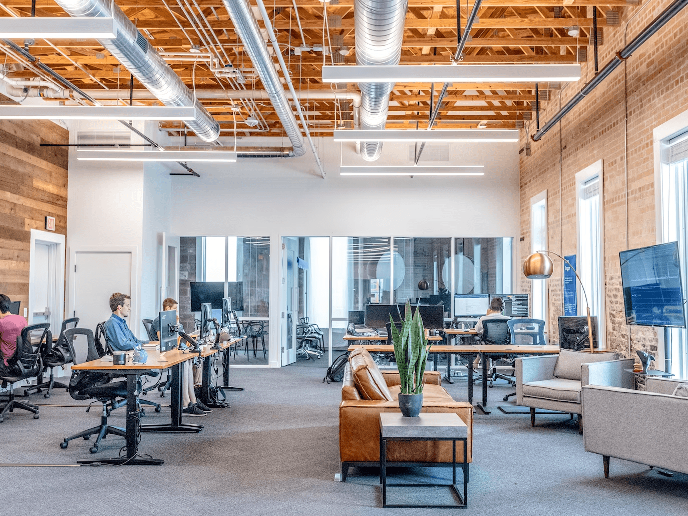 An image of an office space with people working