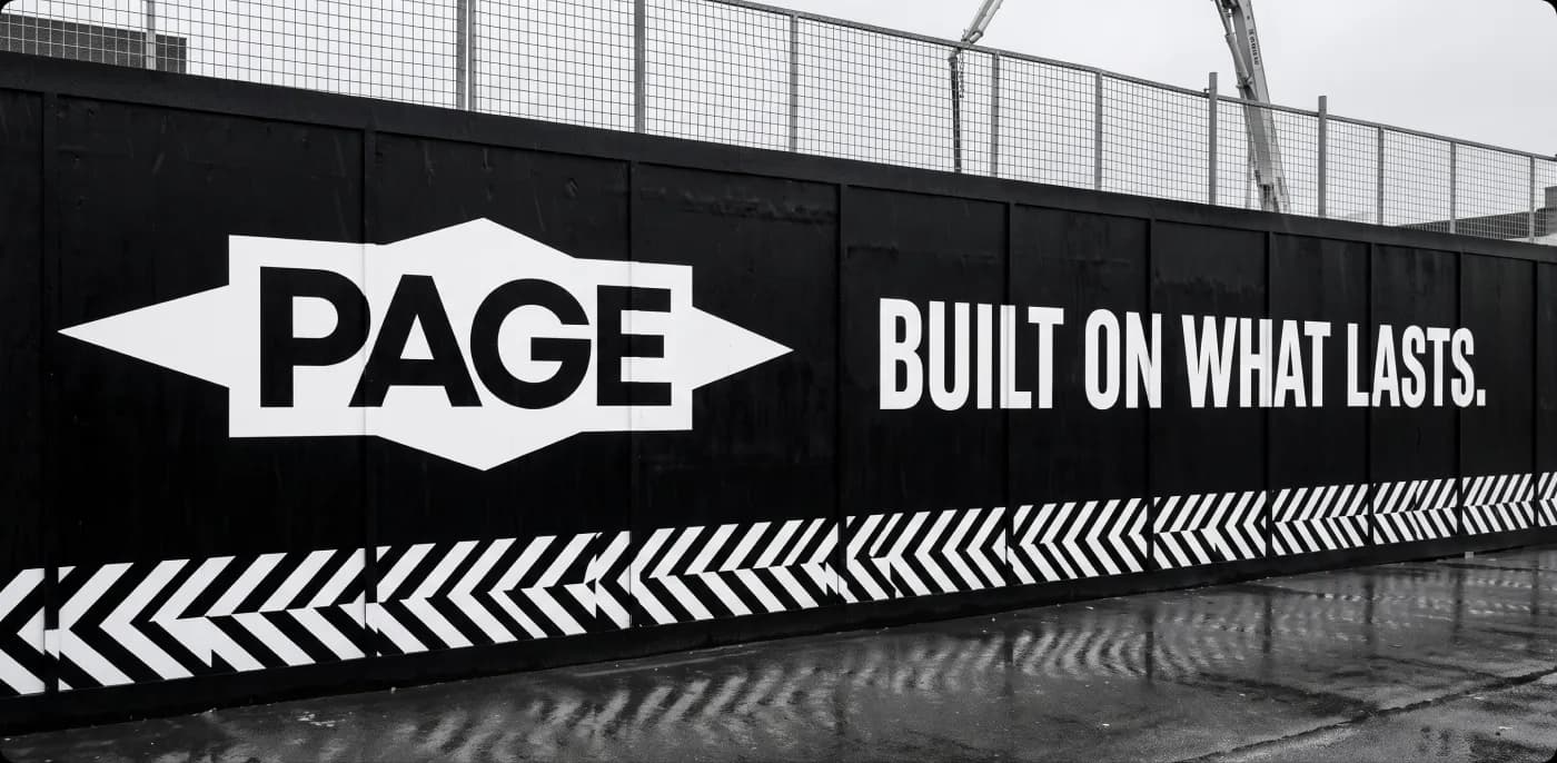 Page Flooring site hoarding reading “Built on what lasts”